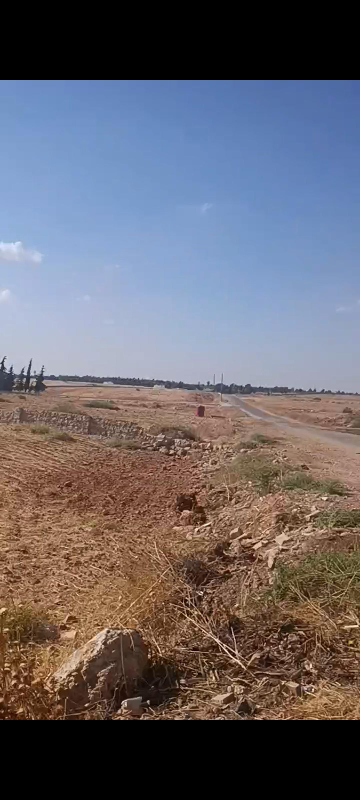 ارض مسيجه للبيع في كفرجوم مقابل مدرسة الجيل العربي
