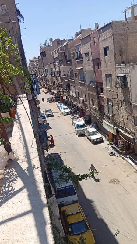 بناء كامل محلين + مستودع+8 شقق جاهزة للسكن