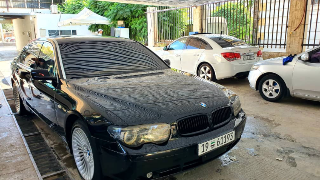 سيارا بي ام 740 بحالا جيدا جدآ خالي برا جوا كاملا مسكرا جاهزا عل فحص