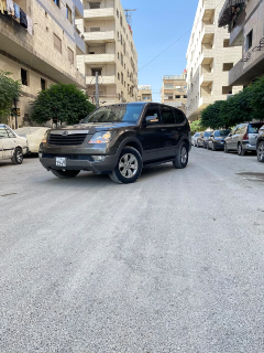 سيارة كيا موهافي 2014 للإيجار في ببيلا - SUV أوتوماتيك بني