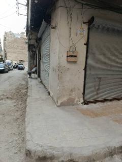 محل تجاري للبيع في صلاح الدين بحلب - 12م² زاوية مثالية وبازار