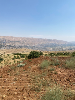 ارض في الزبداني باطلالة خلابة